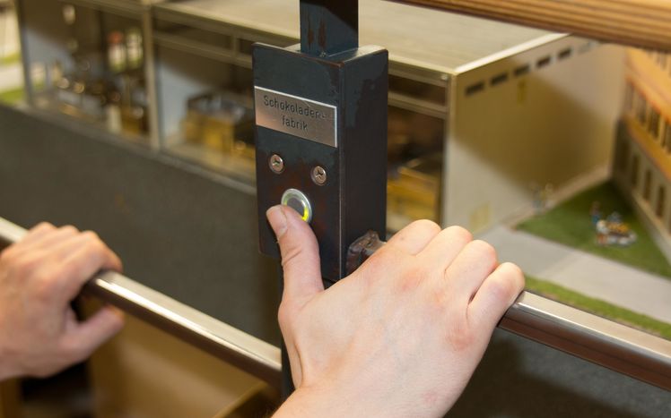 Content Schweiz Schokoladenfabrik Knopfdruckaktion