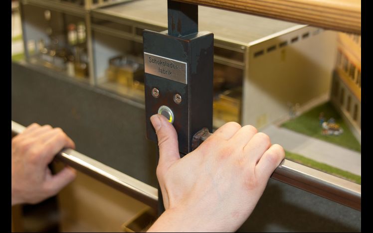 Content Schweiz Schokoladenfabrik Knopfdruckaktion